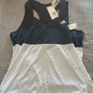Tennis anyone? Adidas tennis outfit. Large.